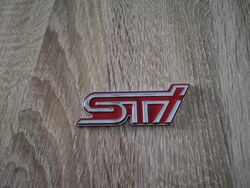 Subaru STI Silver with Red Emblem Logo
