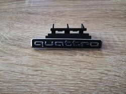 Audi Quattro Silver with Black Grille Emblem Logo